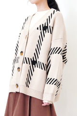 Beige loose cut cardigan in check pattern
