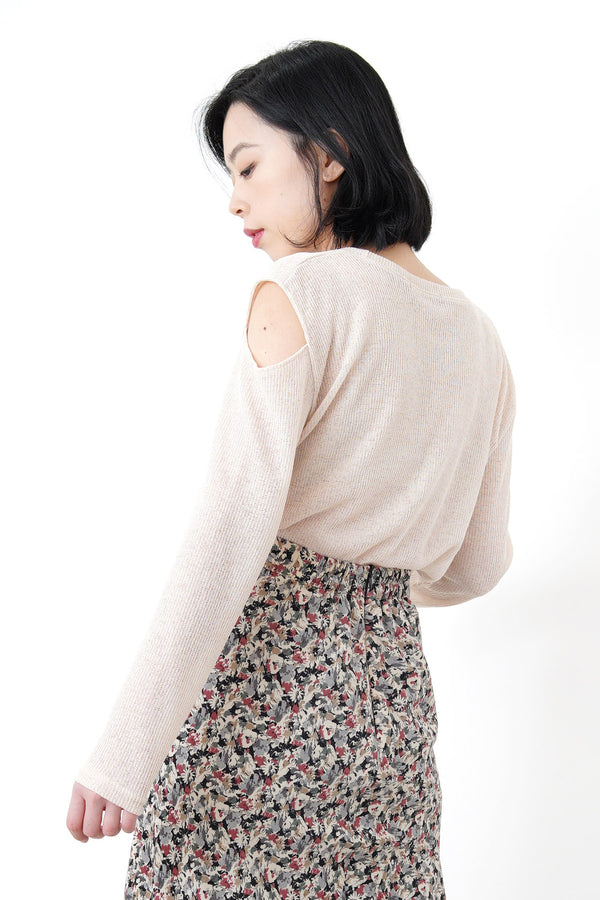 Ivory top in cut out sleeves detail
