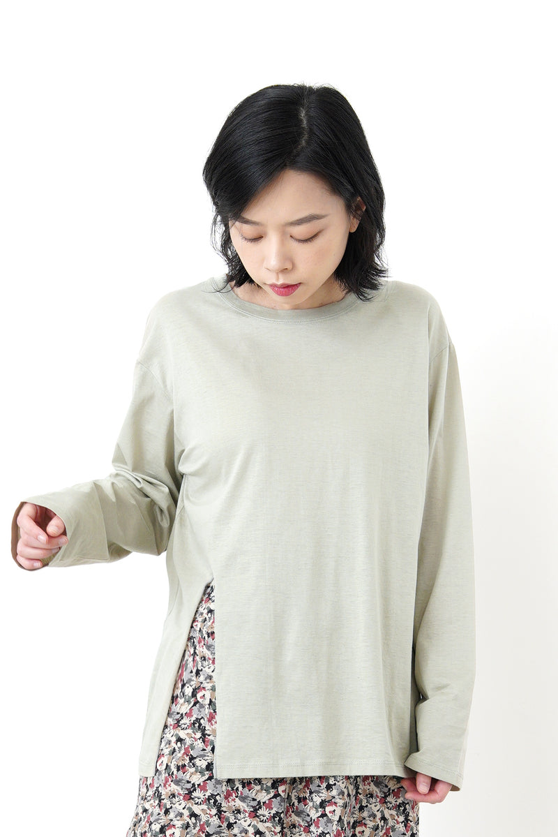 Pale green cotton top in split hem