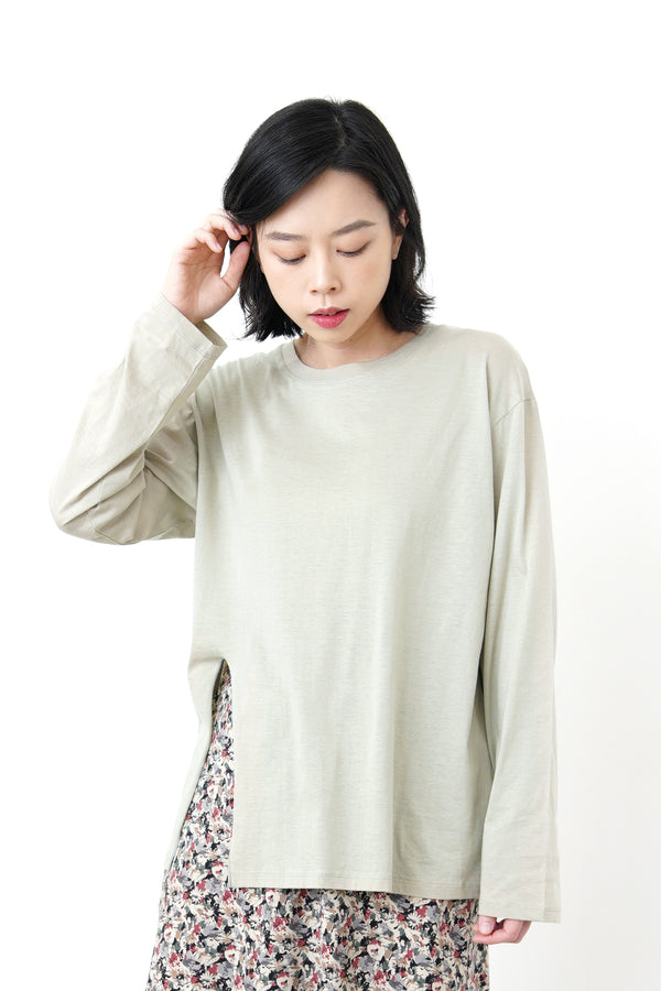 Pale green cotton top in split hem