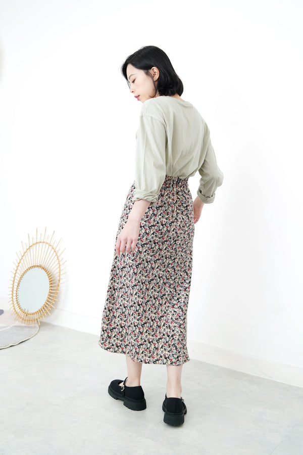 Pale green cotton top in split hem