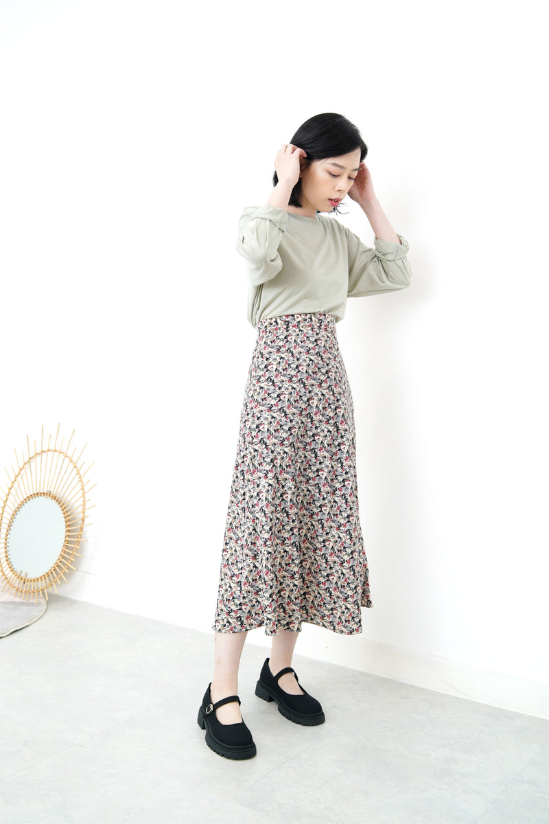 Pale green cotton top in split hem