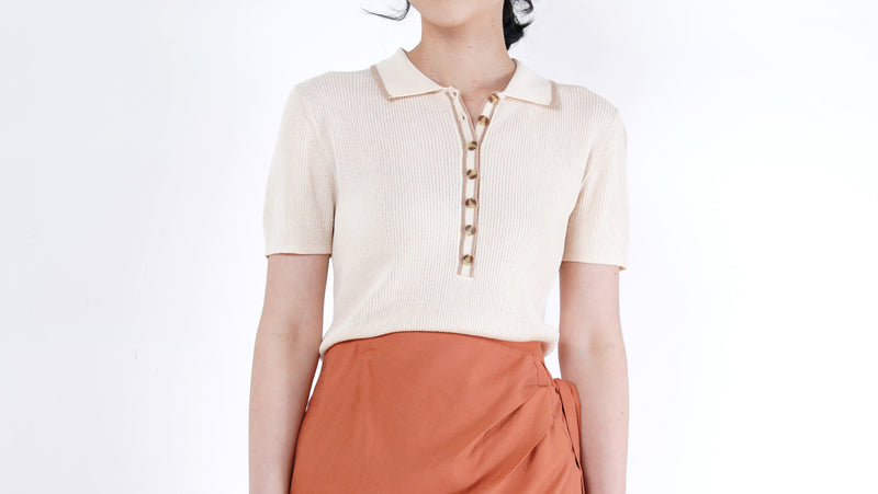 Beige knit polo top w/ contrast fringe