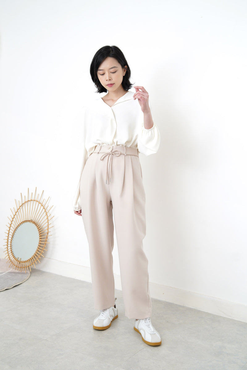 Ivory loose cut blouse in stepped hem