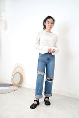 Blue denim wide leg jeans in ripped details