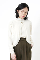 Ivory wool cardigan in round hem