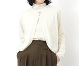 Ivory wool cardigan in round hem