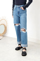 Blue denim wide leg jeans in ripped details
