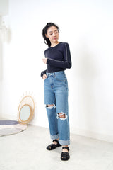 Blue denim wide leg jeans in ripped details