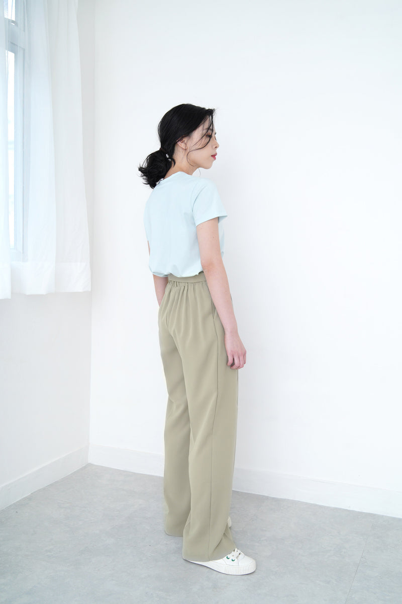 Green straight cut trousers w/ tie waist details