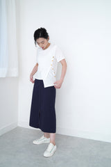 White tee top w/ asy. button details