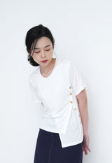 White tee top w/ asy. button details