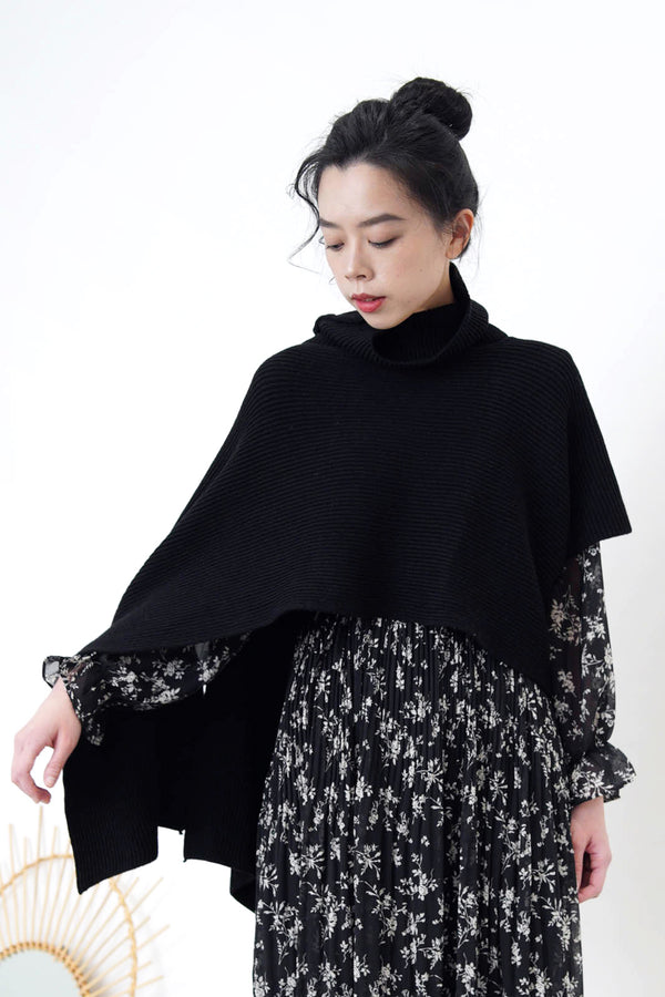 Black knit cape w/ turtleneck collar