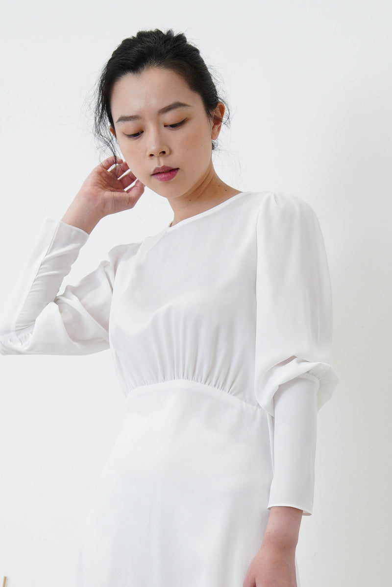 White high neck sweater in elastic hem