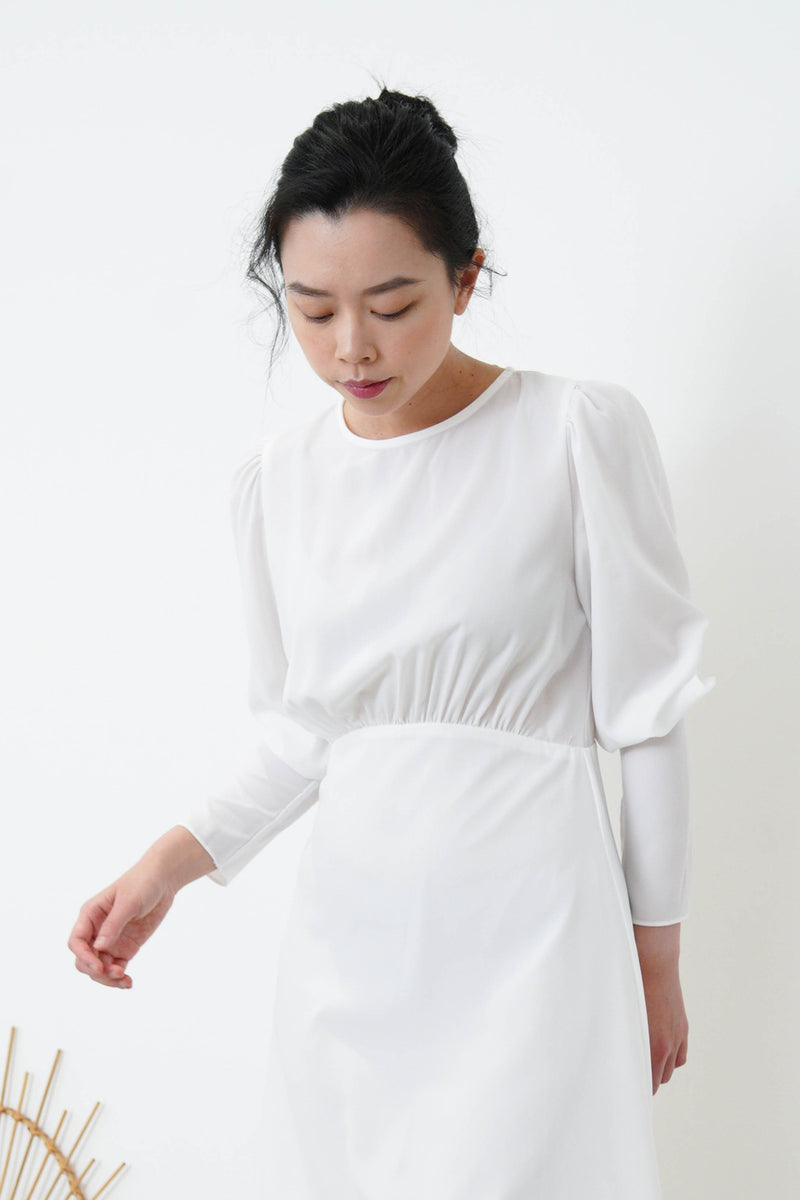 White high neck sweater in elastic hem