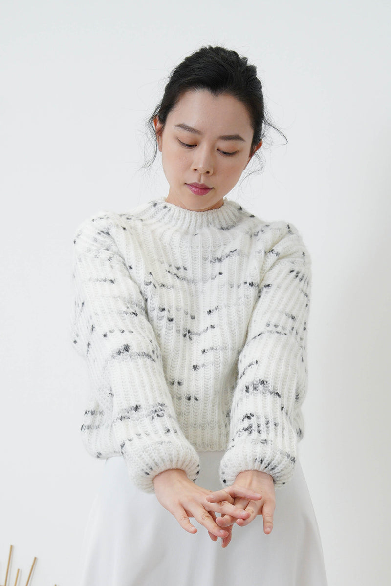White high neck sweater in elastic hem