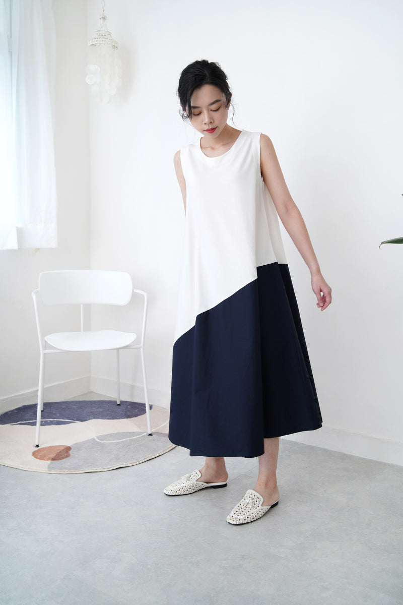White flare cut dress in navy hem