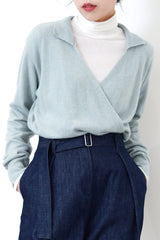 Light blue knit top in overlap v neck cut