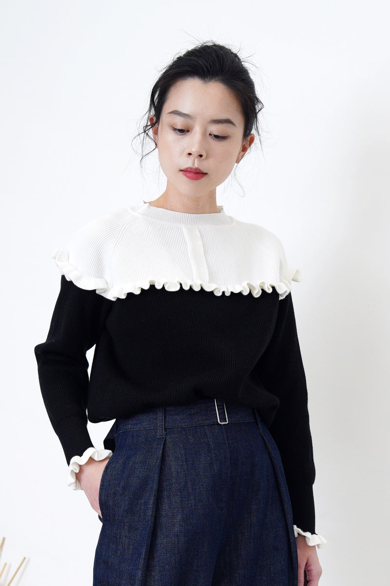 B/W sweater w/ ruffle details