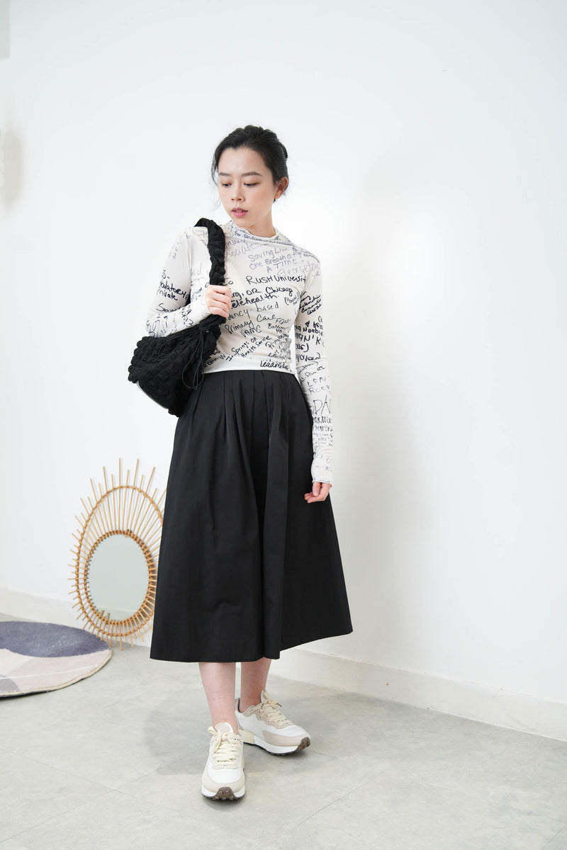 Black texture shoulder bag in elastic handle