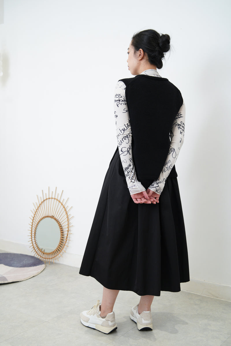 Black wool vest in side vents