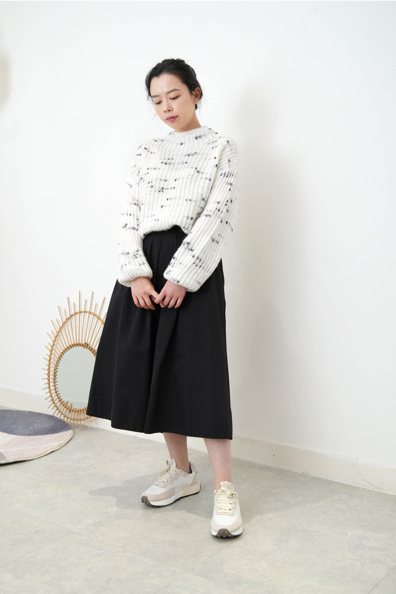 White high neck sweater in elastic hem