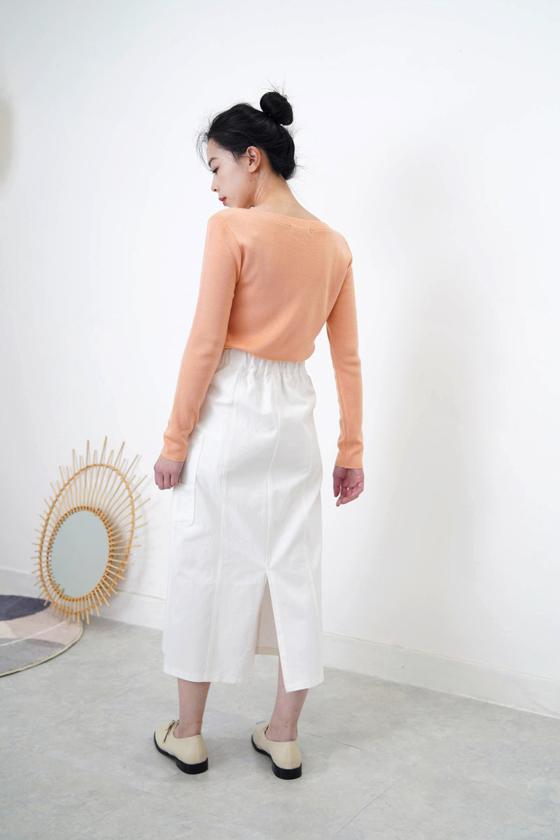 Peach knit boat neckline top