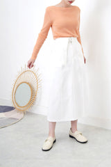Peach knit boat neckline top