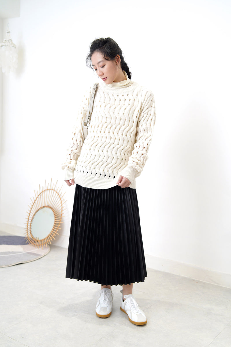 Ivory sweater in wavy crochet pattern