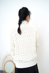Ivory sweater in wavy crochet pattern