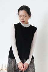 Black wool vest in side vents