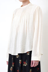 Ivory stand collar satin blouse in pleats