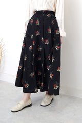 Black floral maxi skirt in pleats