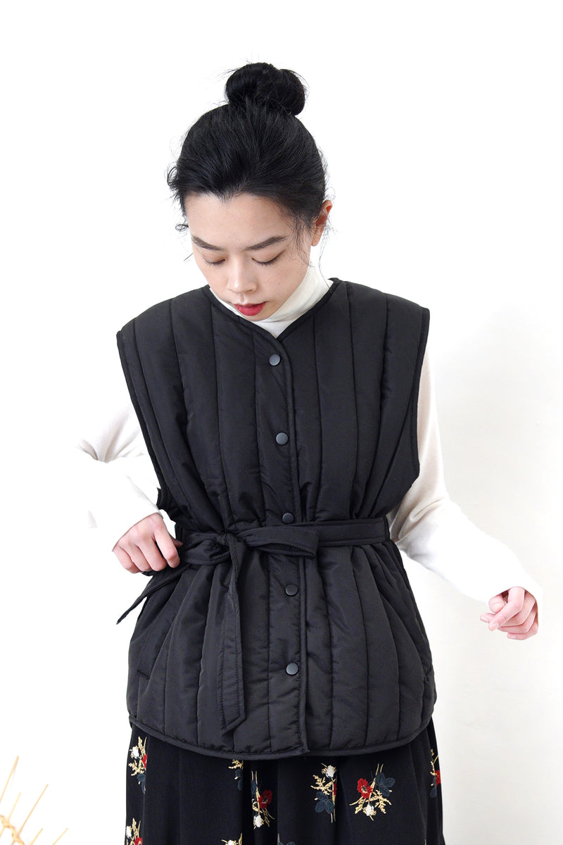 Black quilted vest jacket with waist strap