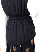 Black quilted vest jacket with waist strap