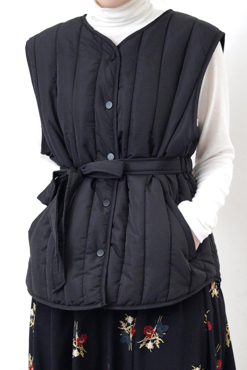 Black quilted vest jacket with waist strap