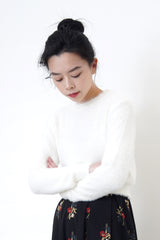 White fluffy sweater in crop cut