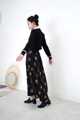Black floral maxi skirt in pleats