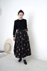 Black floral maxi skirt in pleats