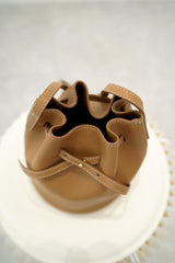 Beige leather mini buckle bag