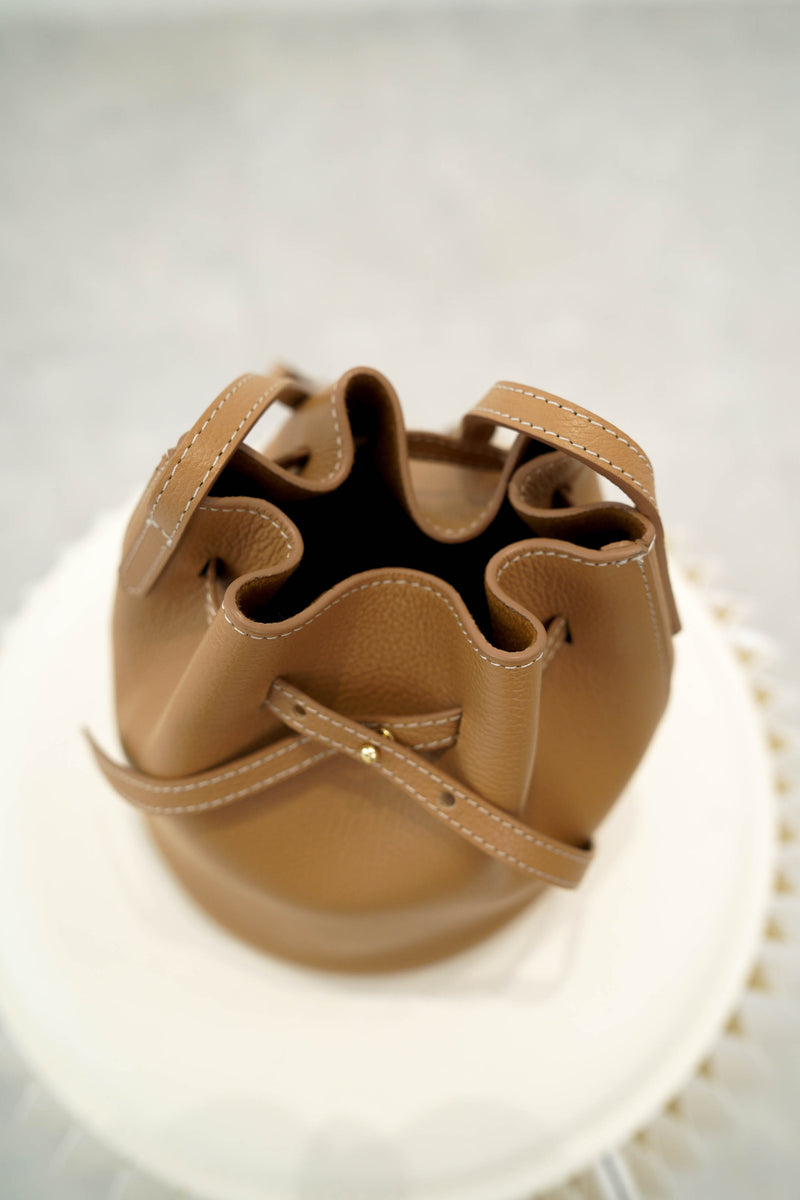 Beige leather mini buckle bag