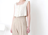 Beige checked trousers in waist detail