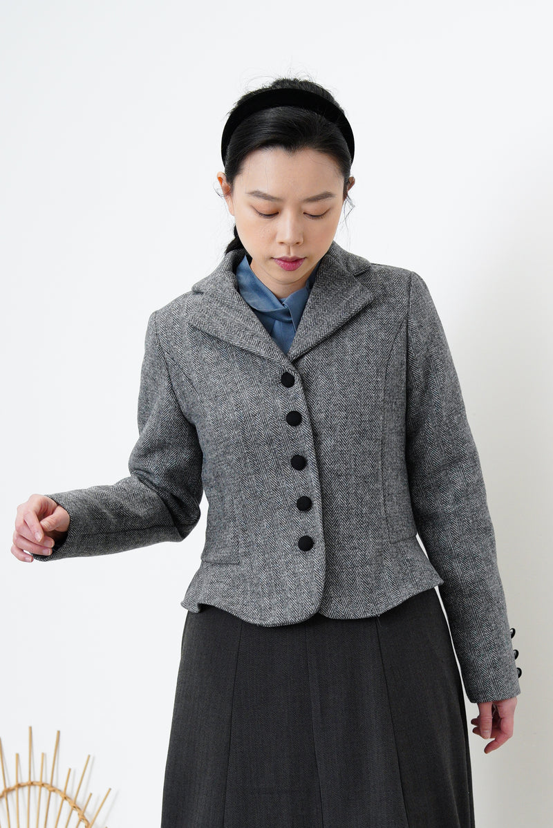 Grey blazer in peplum hem