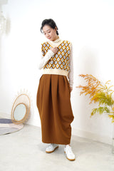 Beige v neck vest in diamond pattern