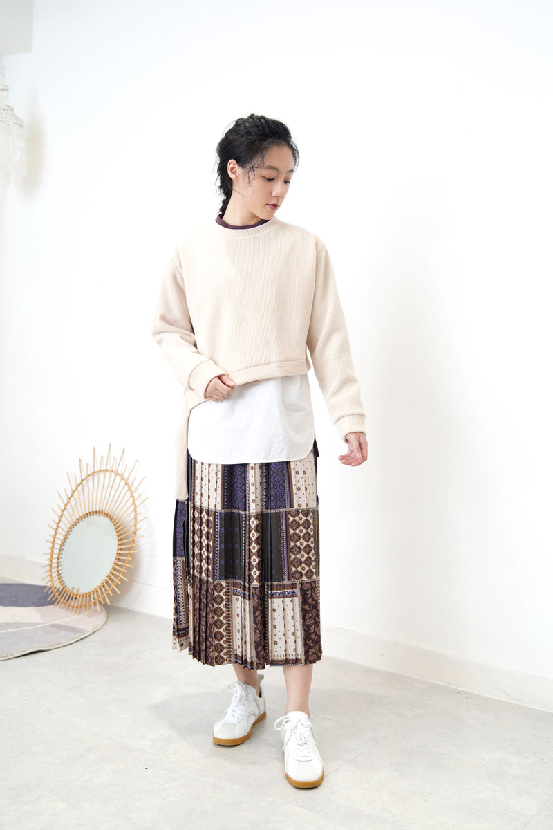 Cream crop pullover in shirt layering