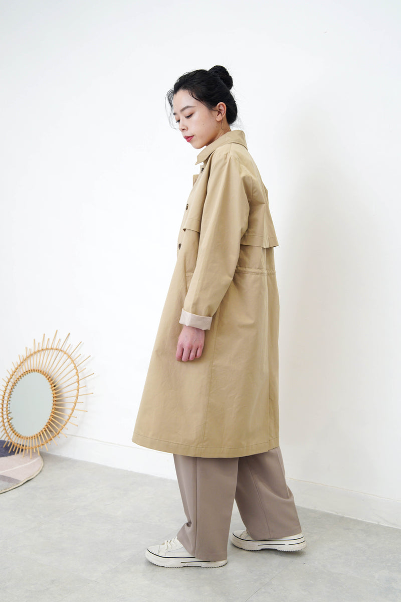 Beige trench coat w/ tie waist detail