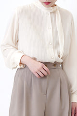 Ivory chiffon texture blouse in detail collar