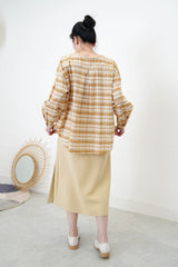 Yellow checked blouse in round hem