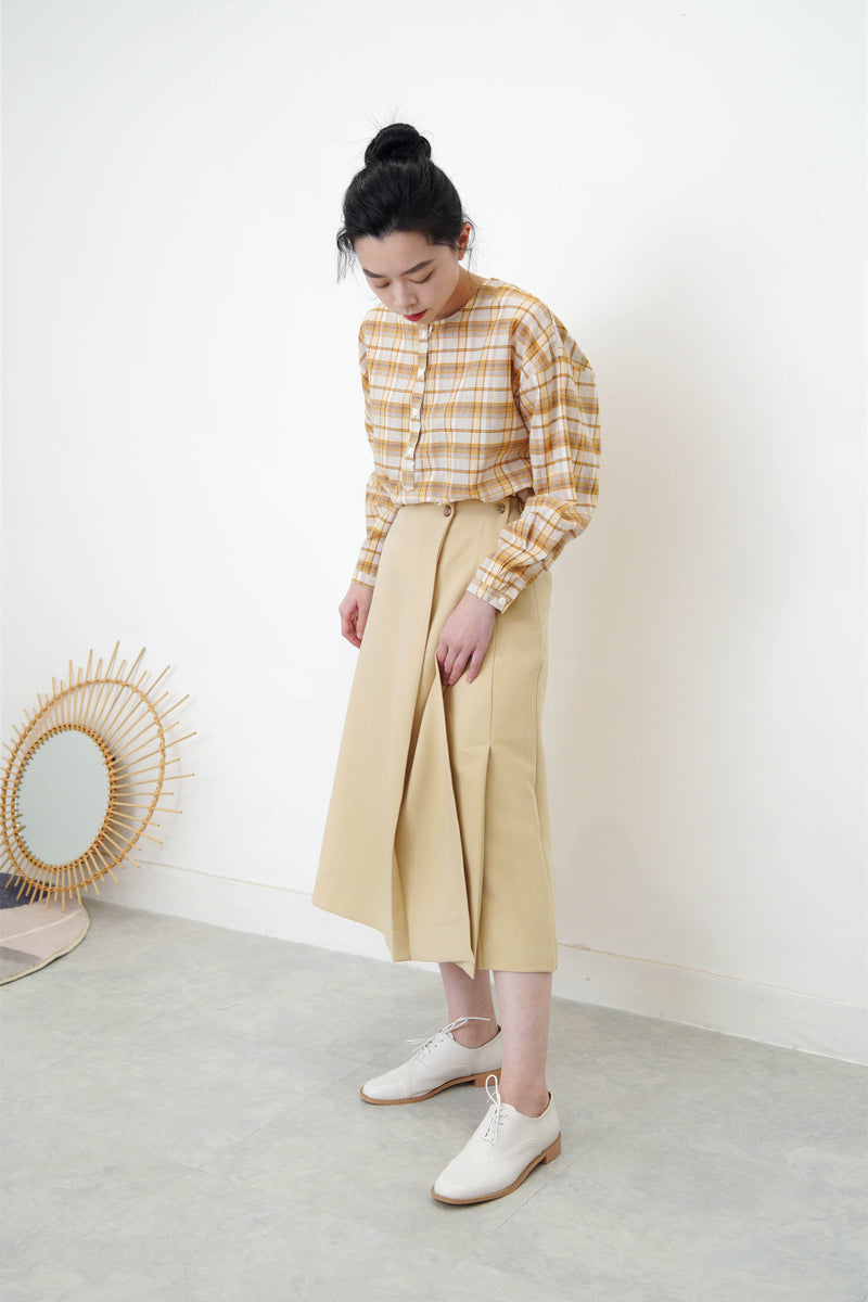 Yellow checked blouse in round hem