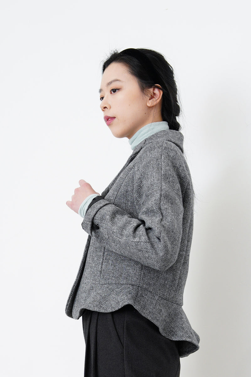 Grey blazer in peplum hem